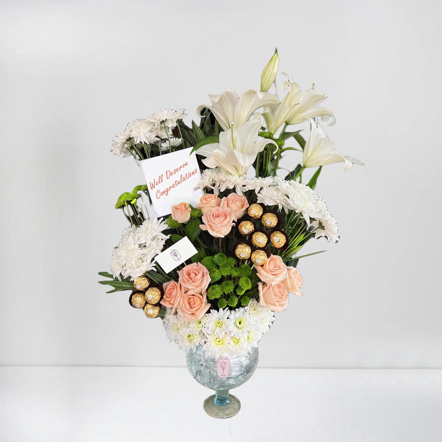 Elegant Peach Roses, White Lilies & Ferrero Chocolates